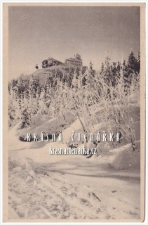 Hora JEŠTĚD a horský hotel v zimě