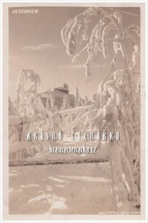 Hora JEŠTĚD a horský hotel v zimě